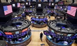 Dow turns positive amid the late stock market reversal