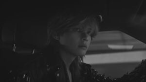 V’s Mesmerizing Journey Unveils: A Glance at ‘Blue’ Teaser from His Debut Album ‘Layover’