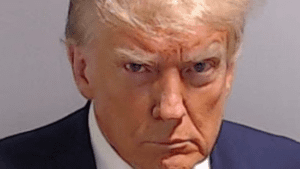 Trump Resurfaces on X with Iconic Mug Shot and Defiant Statement; Elon Musk Reacts