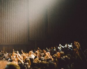 Power of Group of Speakers at a Conference, The Symphony of Knowledge