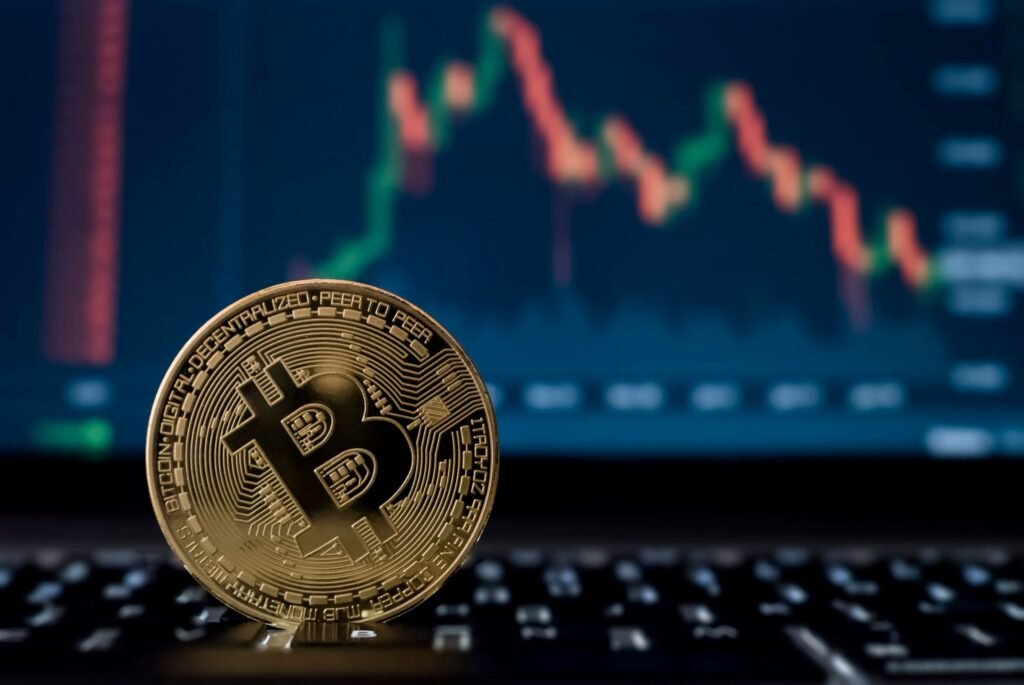 106893887 1623167512779 bitcoin digital crypto currency with stock market candlesticks on computer screen rltheis t20 W7xVwY