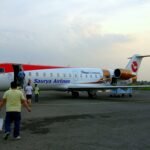 px Saurya Airlines nd Bombardier CRJ holding Nepalese Civil Registration 'N AME'