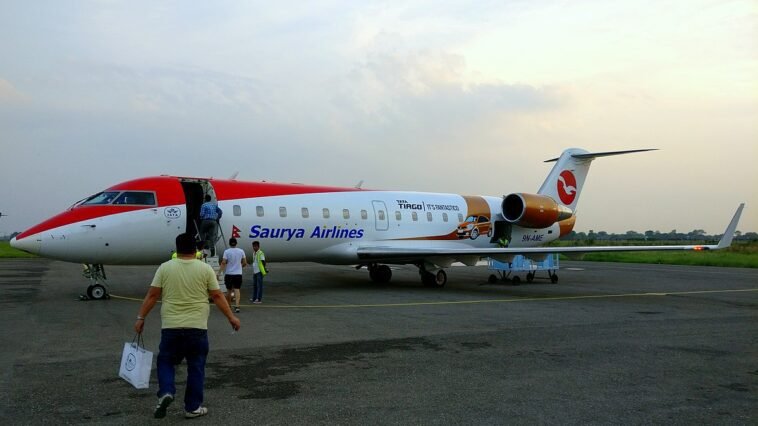 px Saurya Airlines nd Bombardier CRJ holding Nepalese Civil Registration 'N AME'