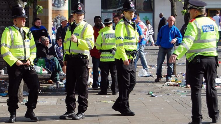 Greater Manchester Police officers in Piccadilly Gardens (Manchester, England)