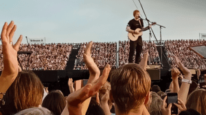 Sheeran Celebrates Ipswich Town Investment on Taylor Swift Stage At Wembley