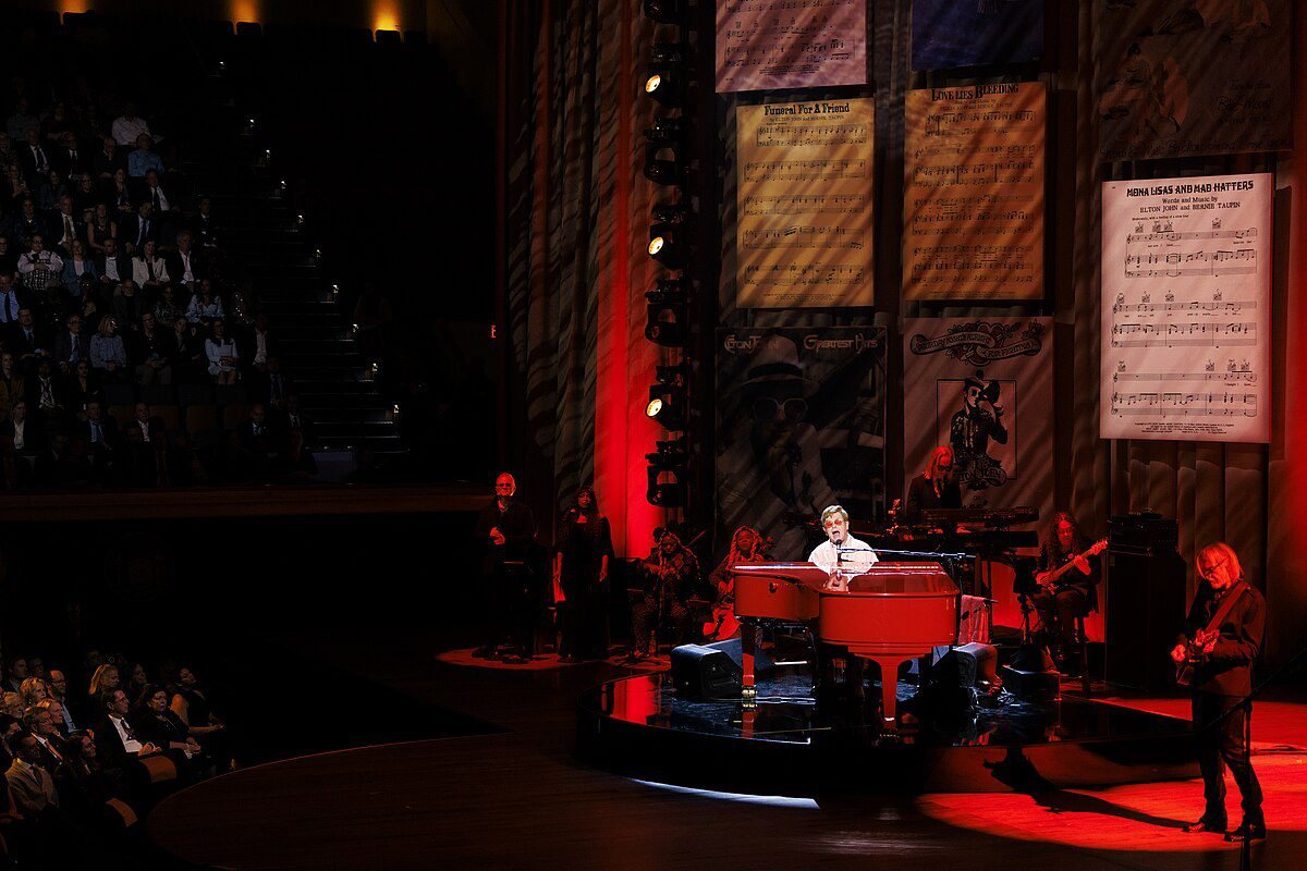 Gershwin Prize for Popular Song honoree Elton John looks over a special collections display of Gershwin sheet music in the Library of Congress Main Reading Room, March , ()