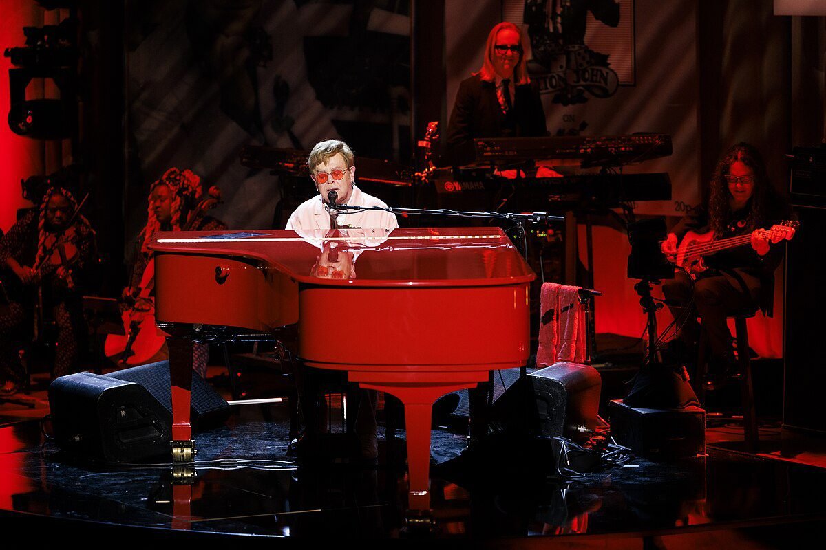 Gershwin Prize for Popular Song honoree Elton John looks over a special collections display of Gershwin sheet music in the Library of Congress Main Reading Room, March , ()